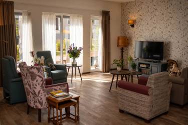huiskamer groepswonen In de huiskamer op groepswonen vinden de werkzaamheden plaats.